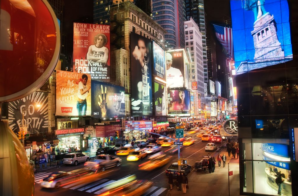 Times Square seems to give the pace for the entire globe and there is almost no other place in the world more known for cityscape photography. It is hard to capture this atmosphere in a unique photograph beside the mainstream. I was happy to find this new vantage point, that combines nicely the busy street scene with the strolling passengers and the oversized billboards.